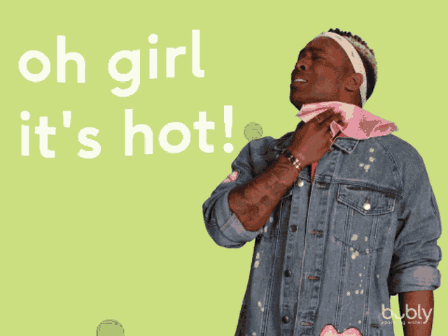 a man in a denim jacket wipes his face with a towel and the words oh girl it 's hot behind him