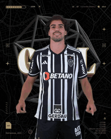 a man wearing a black and white striped jersey with betano on it