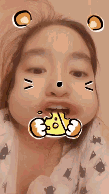 a girl is making a funny face with a sticker on her face that says ' 3 % '