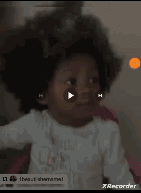a video of a little girl is being played by a xrecorder