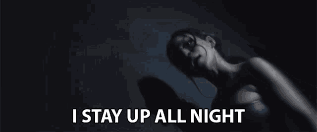 a woman is laying on the floor with the words i stay up all night written above her