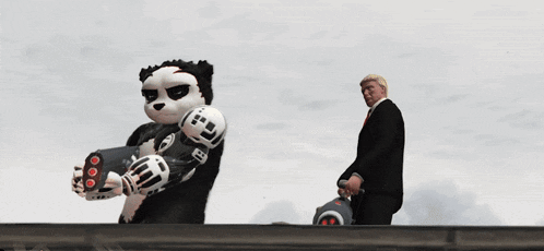 a man in a suit is standing next to a panda mascot on top of a tank that says cis
