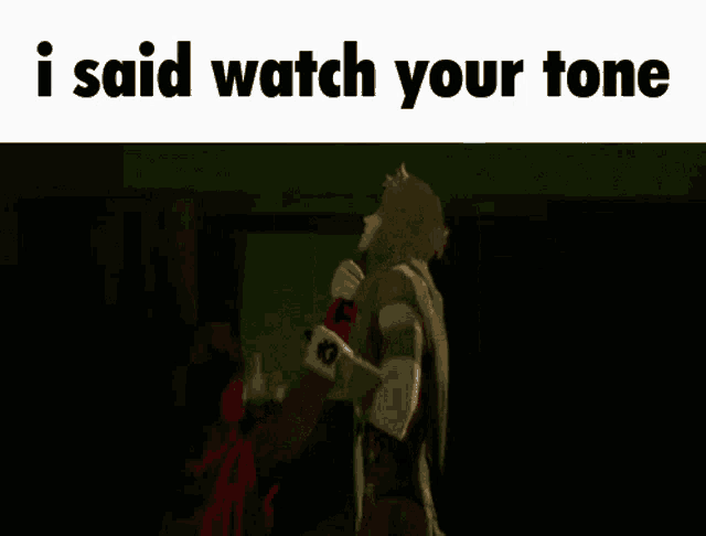 a man is holding a sword in a dark room and says i said watch your tone .