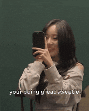a woman taking a picture of herself with the words your doing great sweetie written below her