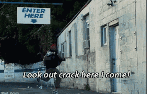 a man running in front of a building with a sign that says " enter here "