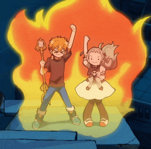 a boy and a girl are standing in front of a flaming background