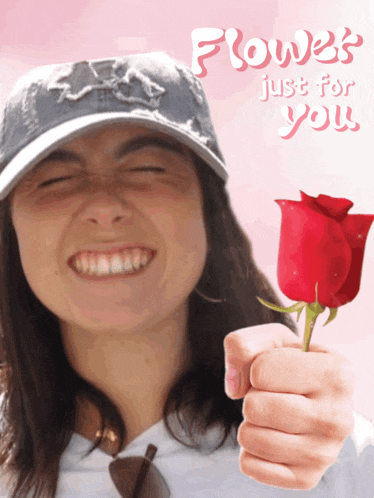a woman wearing a hat is holding a red rose with the words flower just for you behind her