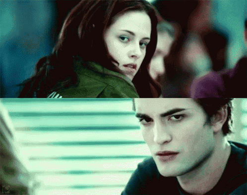 a close up of a woman and a close up of a man looking at each other