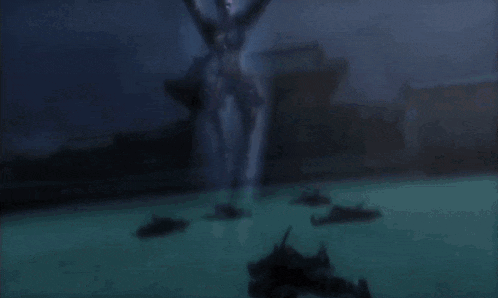 a blurred image of a person with a blue light coming out of their head
