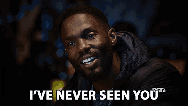 a man says i 've never seen you in front of a dark background
