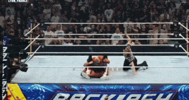 a wrestling ring with the word backlash on the bottom