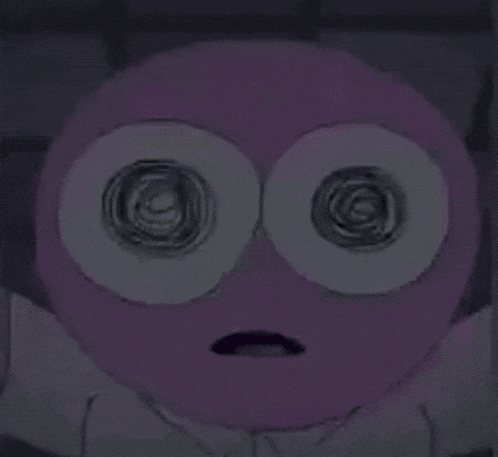 a cartoon character is laying on a bed with a yellow and purple blanket .