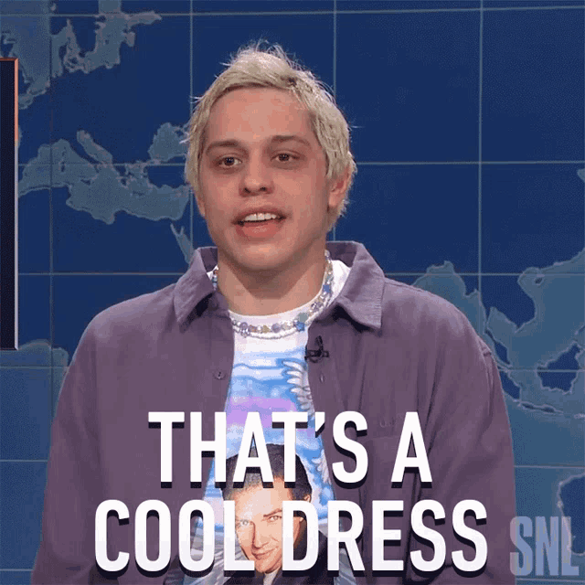 a man in a purple shirt says that 's a cool dress snl