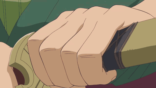 a close up of a person 's hands holding a sword