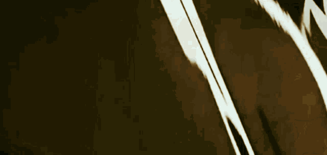 a black and white drawing of a man holding an umbrella in the dark