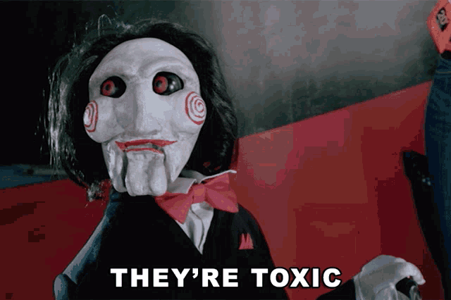 a puppet with the words they 're toxic written on it