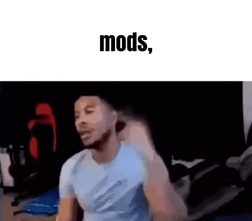 a man in a blue shirt is standing in front of a black background with the words `` mods '' written above him .
