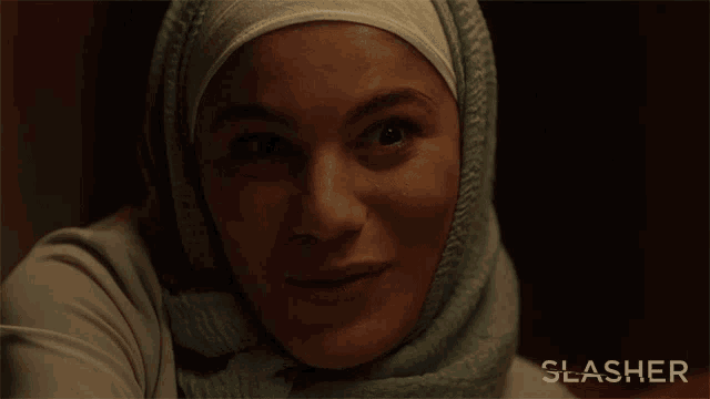 a woman in a hijab says so cute in a slasher ad