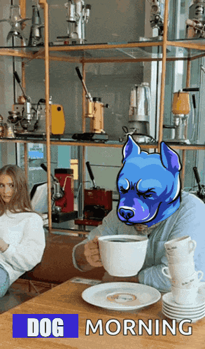 a man sitting at a table holding a cup of coffee with a dog on his head and the words dog morning above him