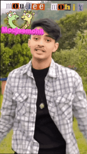 a man in a plaid shirt stands in front of a sign that says mouse mohit