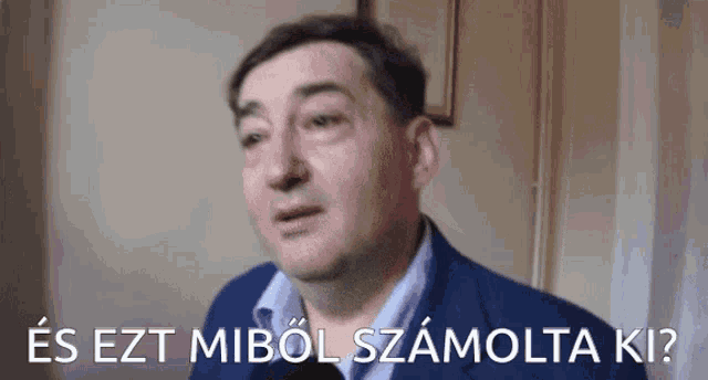 a man in a suit says " es ezt mibol szombata ki " in a foreign language