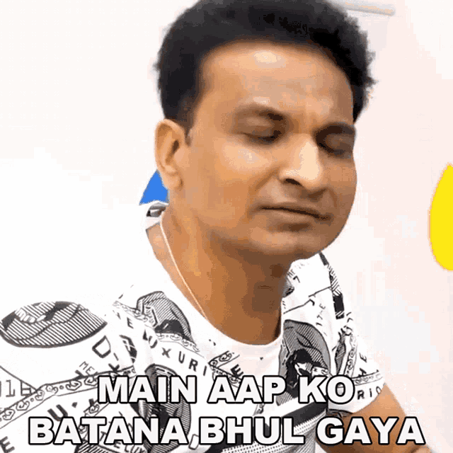 a man is wearing a white shirt that says main aap ko batana bhul gaya