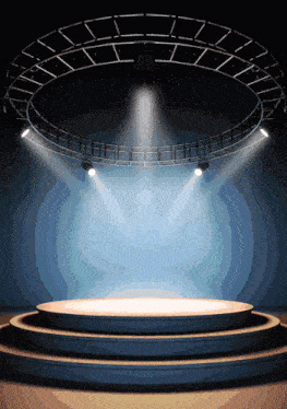 a stage with a few lights on it and a blue background