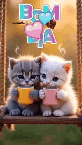 two kittens are sitting on a swing drinking coffee .