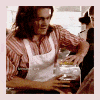 a man in an apron is holding a jar with the name johnny depp on it