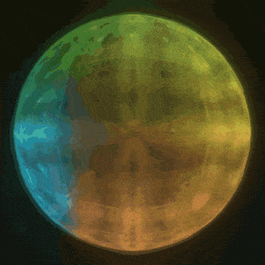 a colorful globe with a dark background and a few spots of light