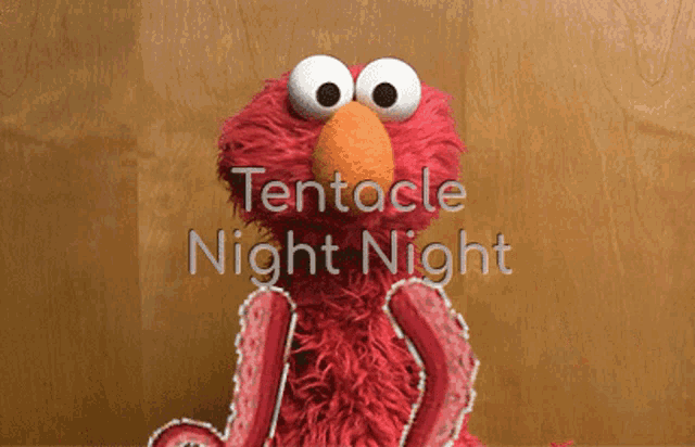 elmo with a tentacle on his arm and the words tentacle night night below him
