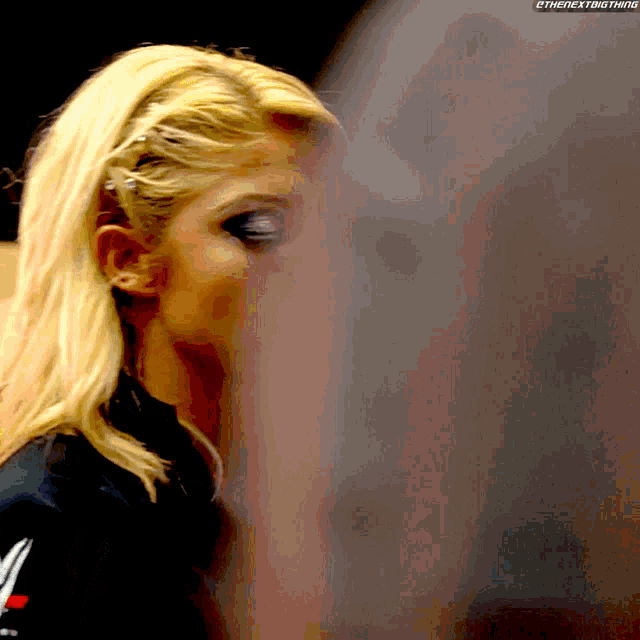 a close up of a woman 's face with a watermark that says the nextbig thing