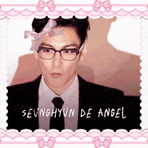 a picture of a man with glasses and the name seunghyun on it