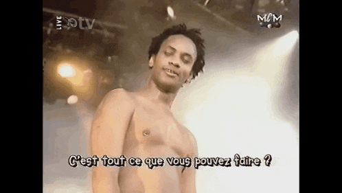 a man without a shirt is standing on a stage with the words c'est tout ce que vous pouvez faire