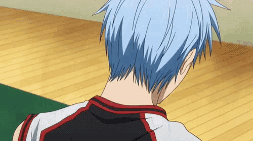 a man with blue hair is wearing a black and white jersey with red stripes .