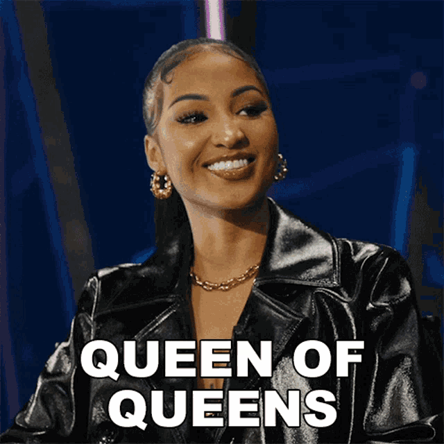 a woman in a black leather jacket is smiling and the words queen of queens are behind her