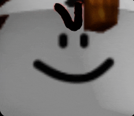 a close up of a smiley face with a shadow of a person on it .