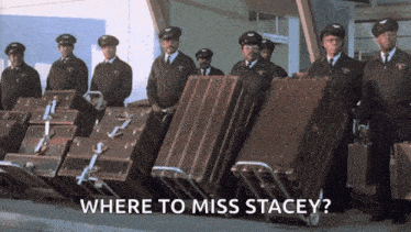 a group of men carrying luggage with the words where to miss stacey on the bottom