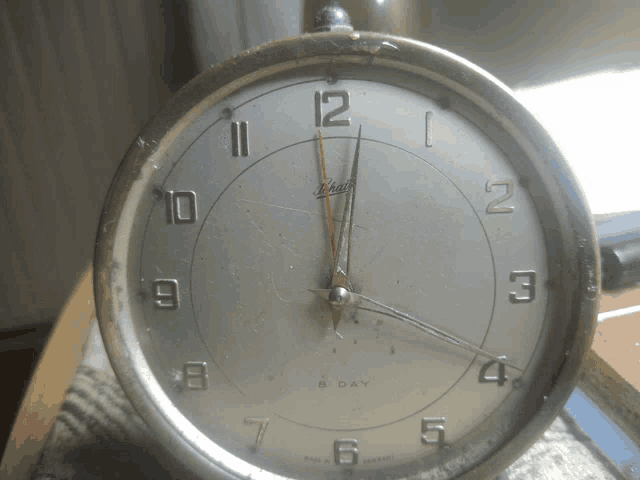 a clock that says 2 day on the face