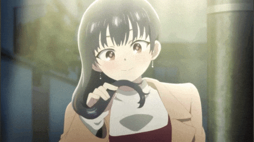 a girl in a brown coat is holding her hair