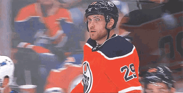 a hockey player wearing a jersey with the number 29