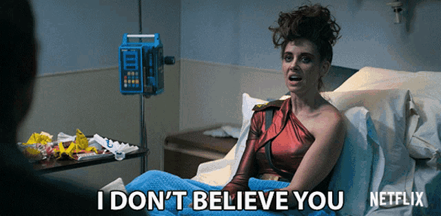 a woman in a hospital bed says i don t believe you