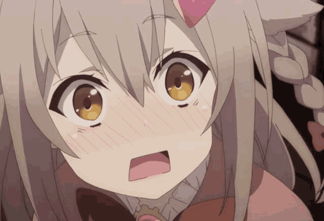 a close up of a girl 's face with her mouth open