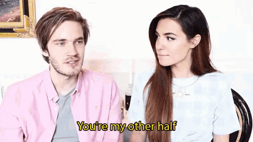 a man and a woman are looking at each other and the woman is saying you 're my other half .
