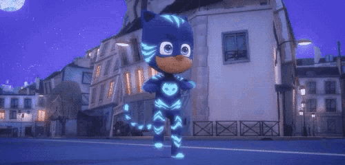 a cartoon character in a cat costume is walking down a street