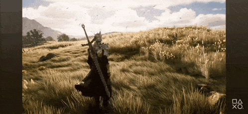 a person holding a sword in a field with a playstation logo on the bottom