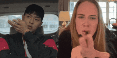 a man and a woman are sitting next to each other on a video call