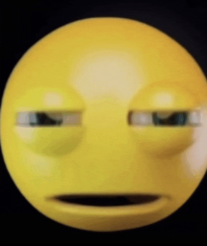 a close up of a yellow smiley face with a serious look on its face