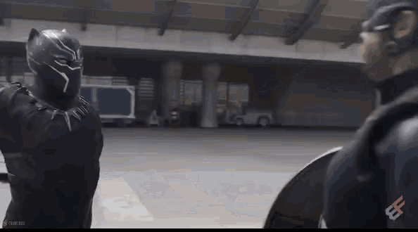 a black panther and captain america are standing next to each other on a street .