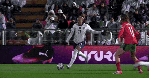 a soccer player with the number 11 on their jersey